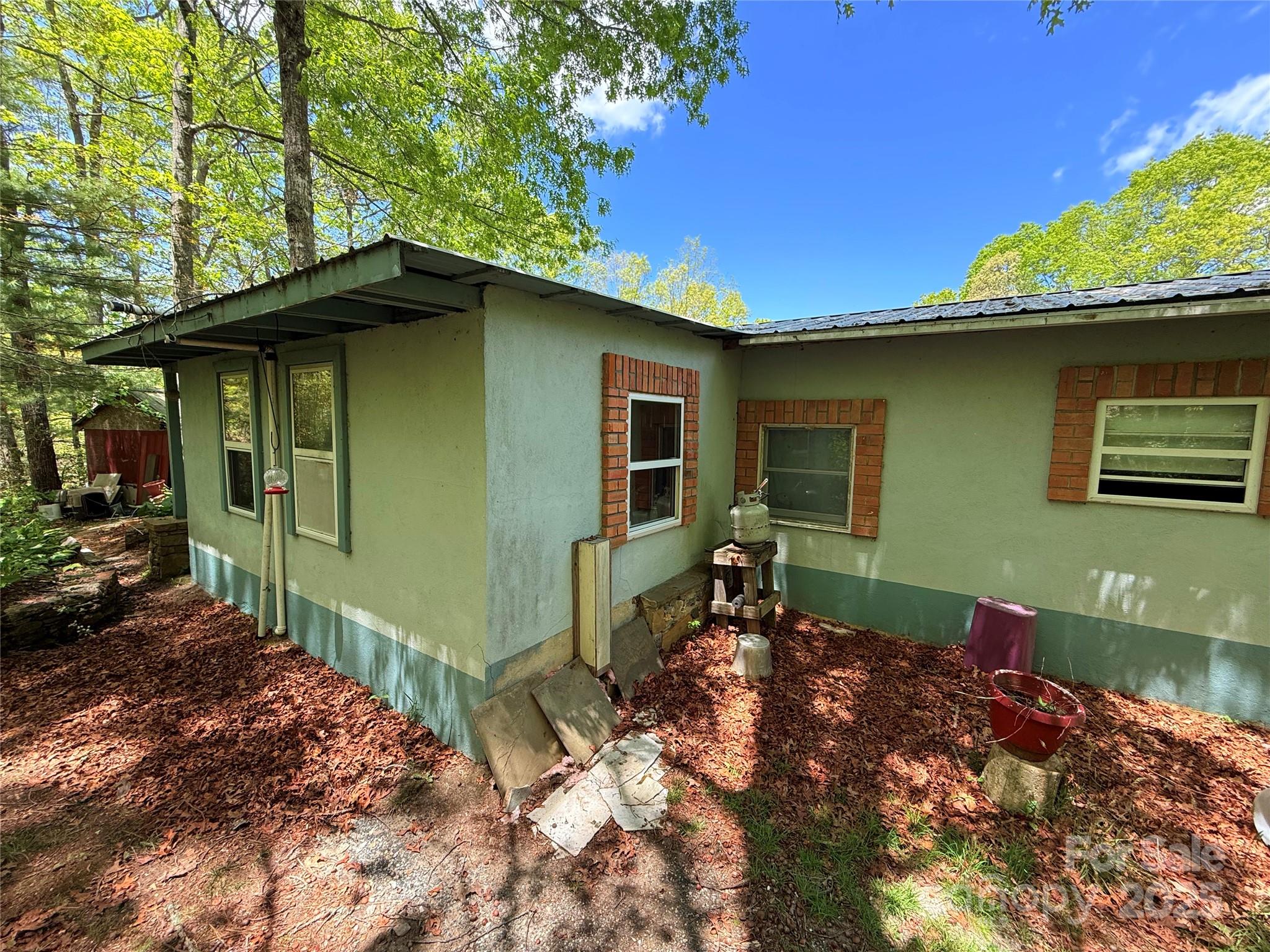 630 Deerchase Circle Cedar Mountain, NC 28718 - Photo 12 of 18 a backyard of a house with lots of green space