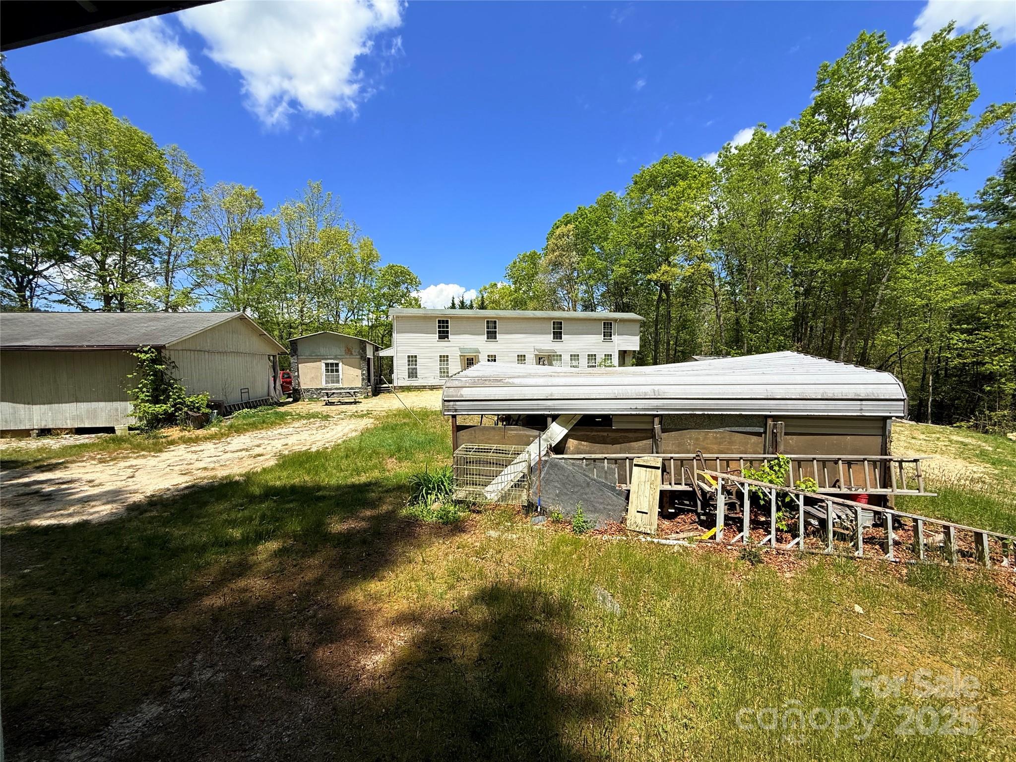 630 Deerchase Circle Cedar Mountain, NC 28718 - Photo 13 of 18 a view of house with swimming pool yard and outdoor seating