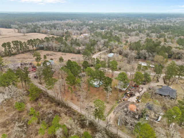a view of a city with green space