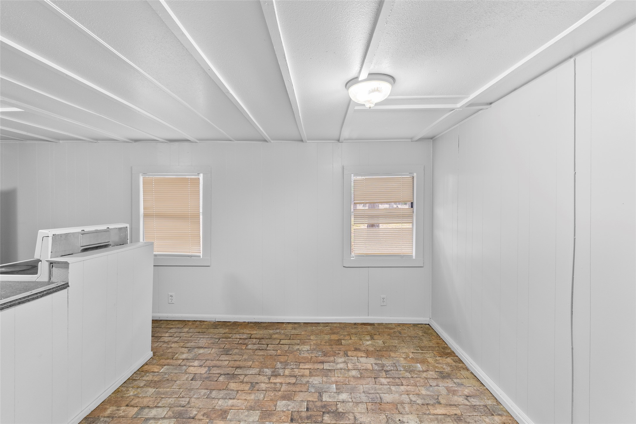 31C Jackson Road, Unit C Huntsville, TX 77320 - Photo 5 of 16 a view of an empty room with a window