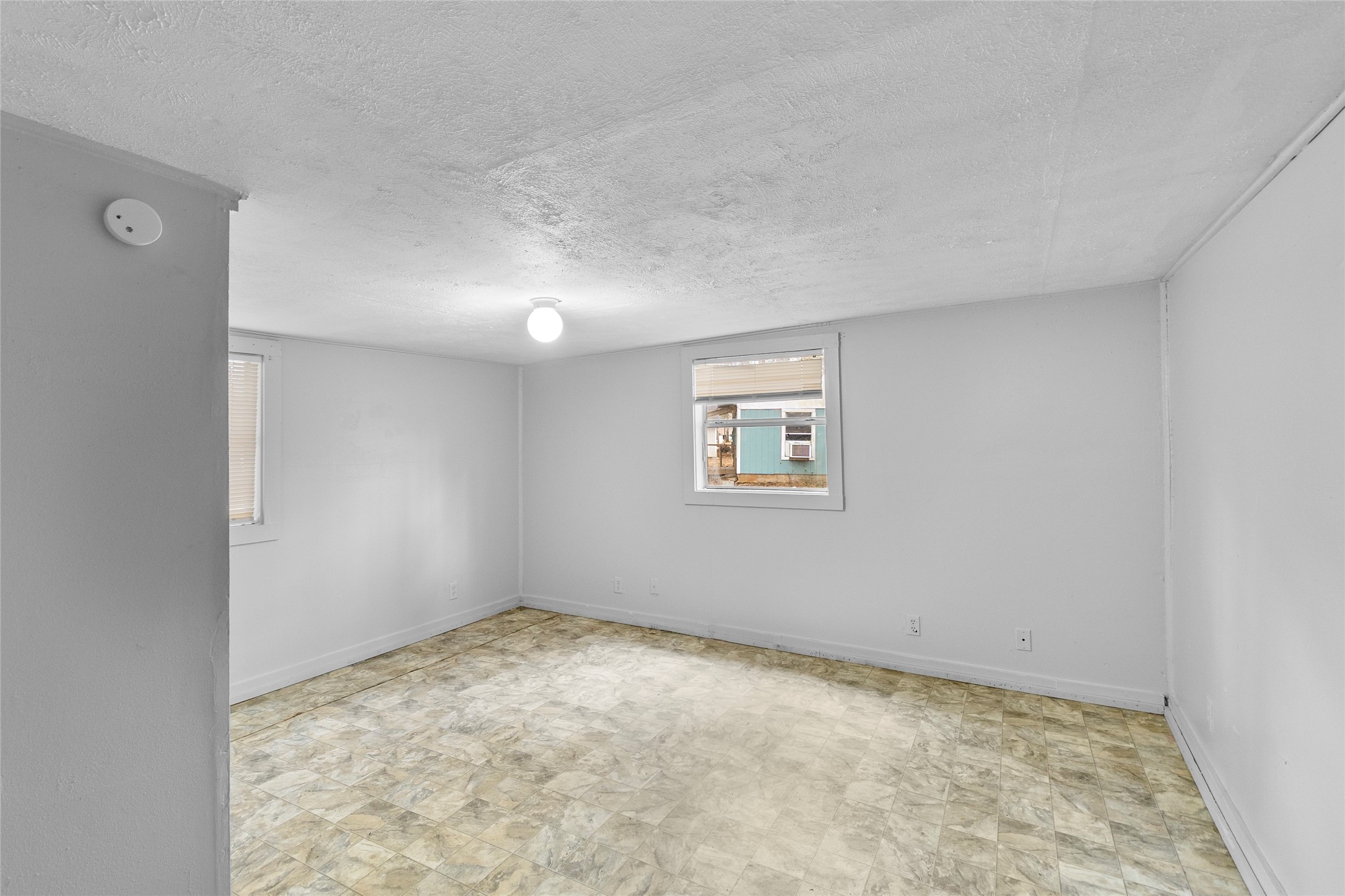 31C Jackson Road, Unit C Huntsville, TX 77320 - Photo 8 of 16 an empty room with a workbench