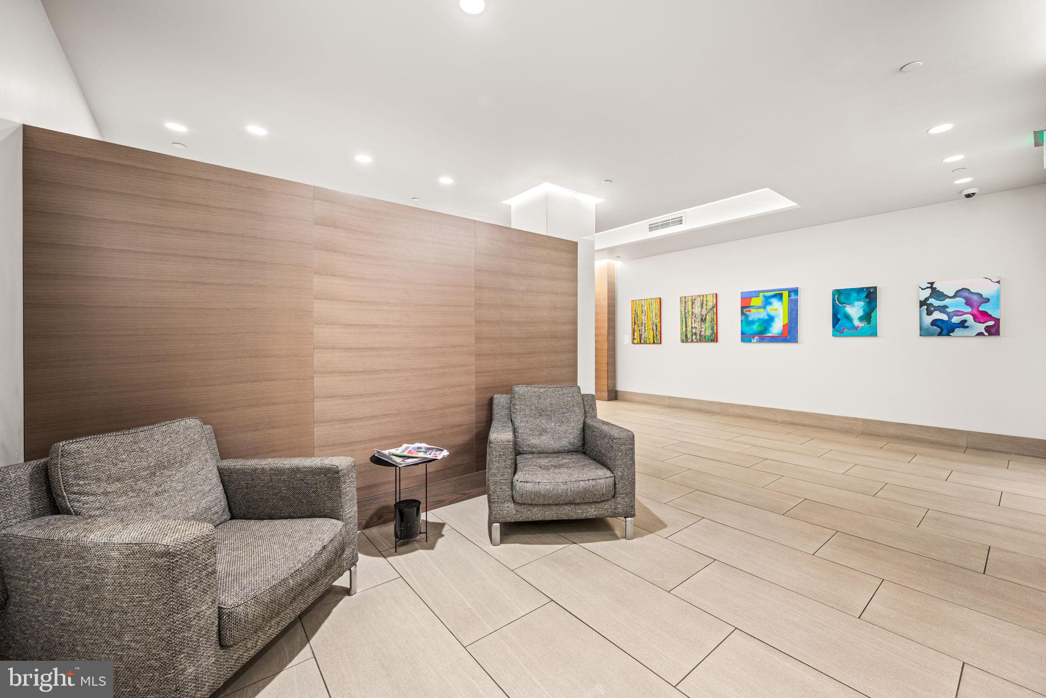 2018 Walnut Street, Unit 15M Philadelphia, PA 19103 - Photo 26 of 31 a living room with furniture and a couch