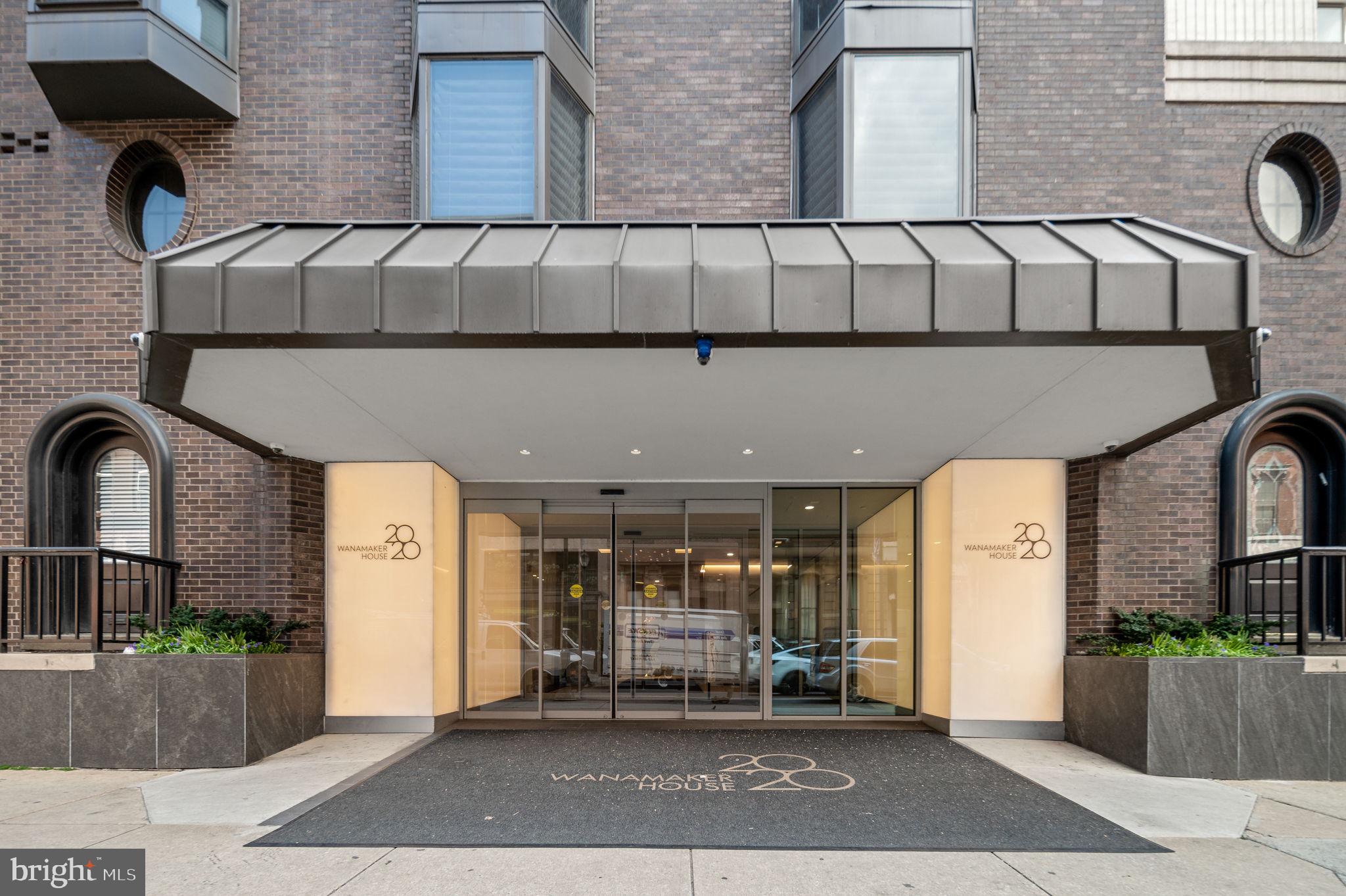 2018 Walnut Street, Unit 15M Philadelphia, PA 19103 - Photo 29 of 31 a front view of a building with retail shops
