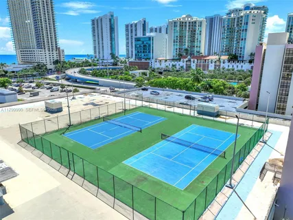 a view of a backyard with sitting area