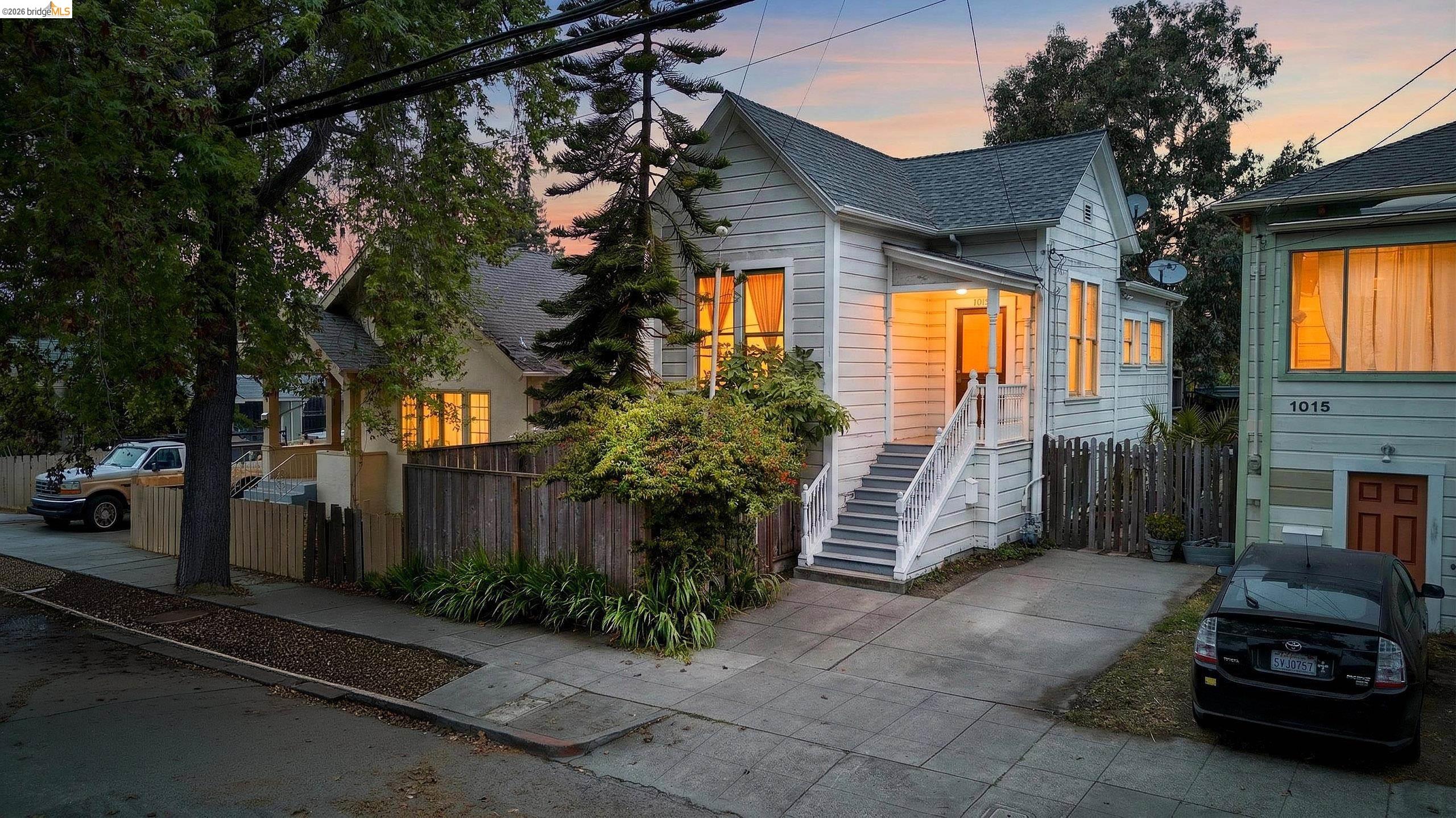 View of front of home featuring a shingled roof