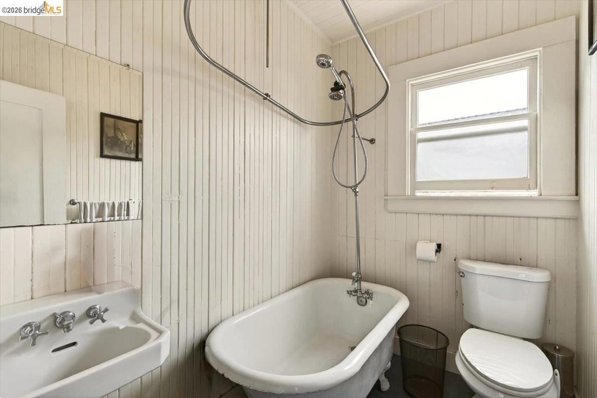 1013 Addison Street Berkeley, CA 94710 - Photo 28 of 57 Full bath featuring wooden walls and a combined bath / shower with freestanding tub