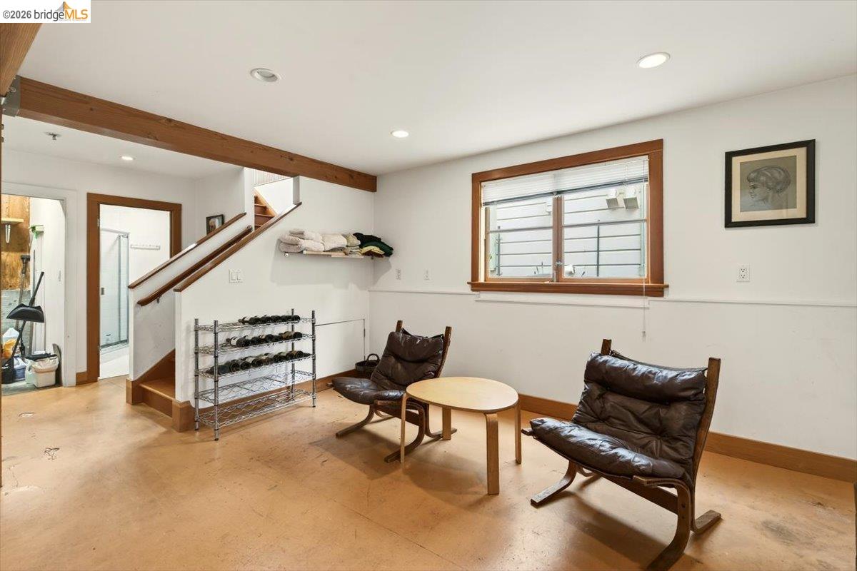 1013 Addison Street Berkeley, CA 94710 - Photo 35 of 57 Sitting room with recessed lighting, beam ceiling, and concrete flooring