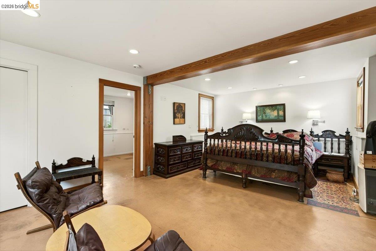 1013 Addison Street Berkeley, CA 94710 - Photo 38 of 57 Bedroom with recessed lighting, beam ceiling, and finished concrete floors