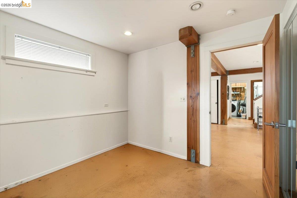 1013 Addison Street Berkeley, CA 94710 - Photo 41 of 57 Spare room with finished concrete flooring and washer / clothes dryer