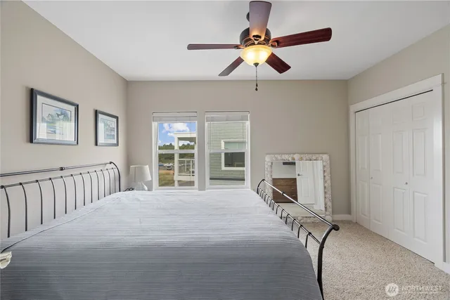 a bedroom with a bed and window