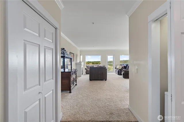 a room with furniture and a large window