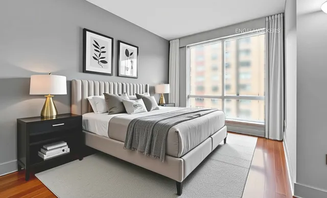 a kitchen with granite countertop a refrigerator and a stove top oven