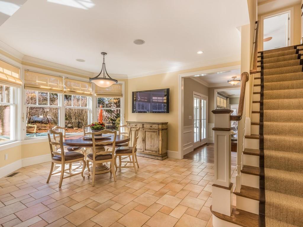 5 Saddle Club Road Lexington, MA 02420 - Photo 13 of 42 a view of a dining room with furniture