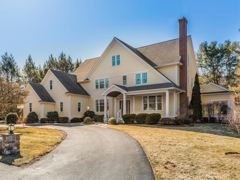 5 Saddle Club Road Lexington, MA 02420 - Photo 2 of 42 a front view of a house with a yard and trees