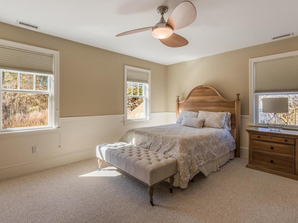 5 Saddle Club Road Lexington, MA 02420 - Photo 29 of 42 a bedroom with a bed and window