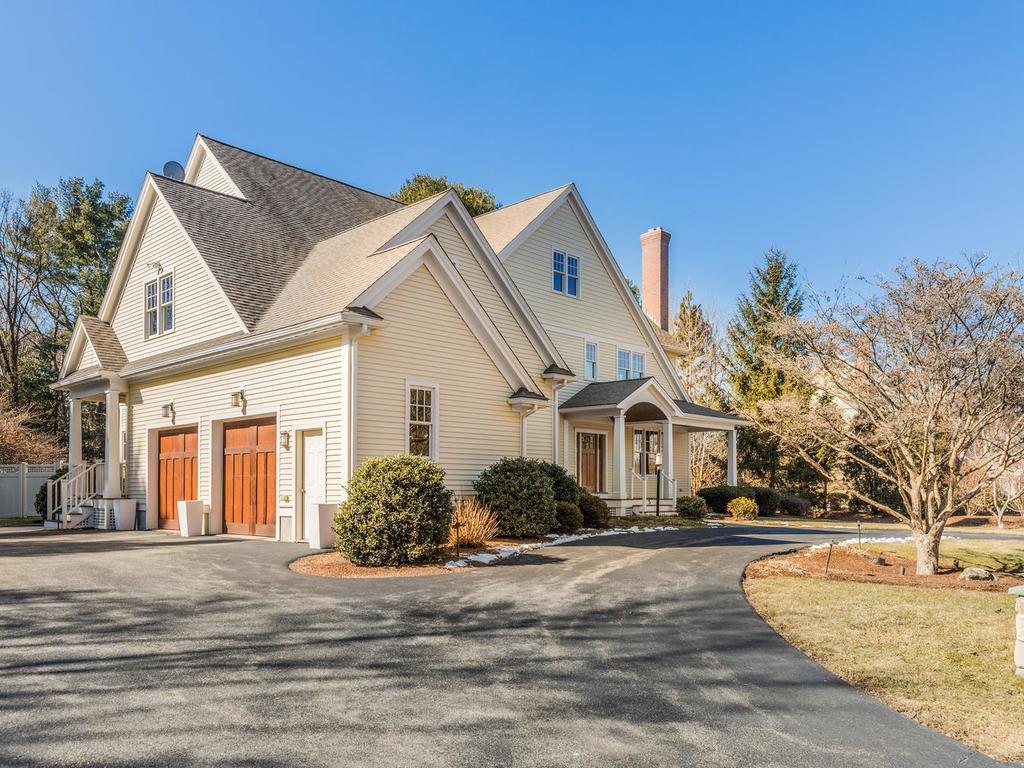 5 Saddle Club Road Lexington, MA 02420 - Photo 3 of 42 a front view of a house with a yard