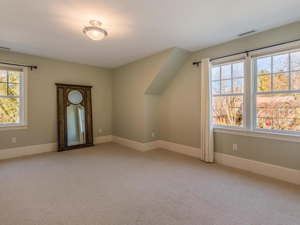 5 Saddle Club Road Lexington, MA 02420 - Photo 31 of 42 an empty room with windows and closet