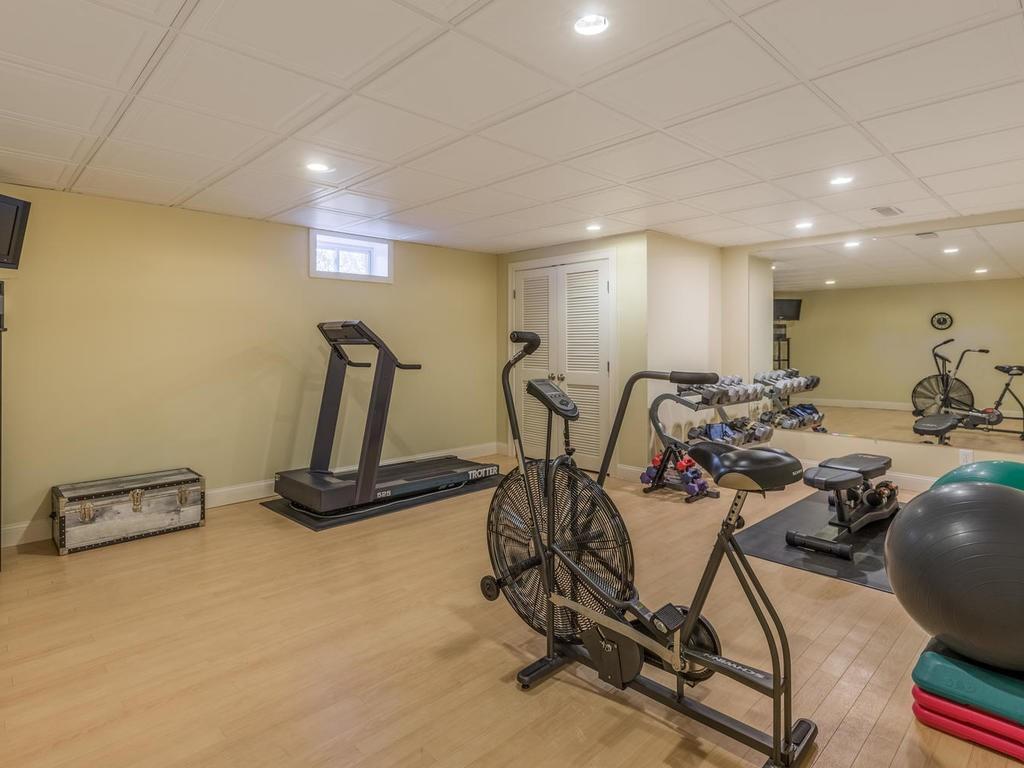 5 Saddle Club Road Lexington, MA 02420 - Photo 36 of 42 a view of a room with gym equipment