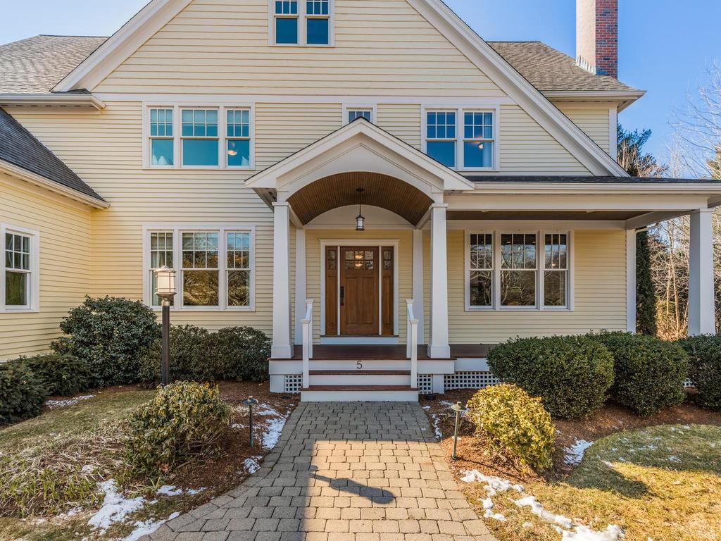 5 Saddle Club Road Lexington, MA 02420 - Photo 4 of 42 a front view of a house with garden