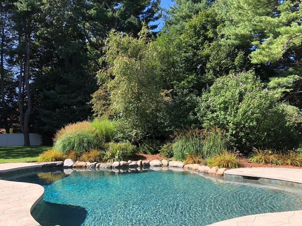 5 Saddle Club Road Lexington, MA 02420 - Photo 42 of 42 a view of a backyard with swimming pool