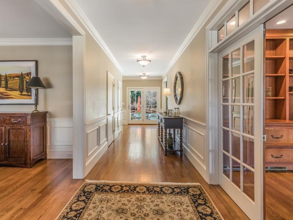 5 Saddle Club Road Lexington, MA 02420 - Photo 5 of 42 a view of living room and kitchen with wooden floor