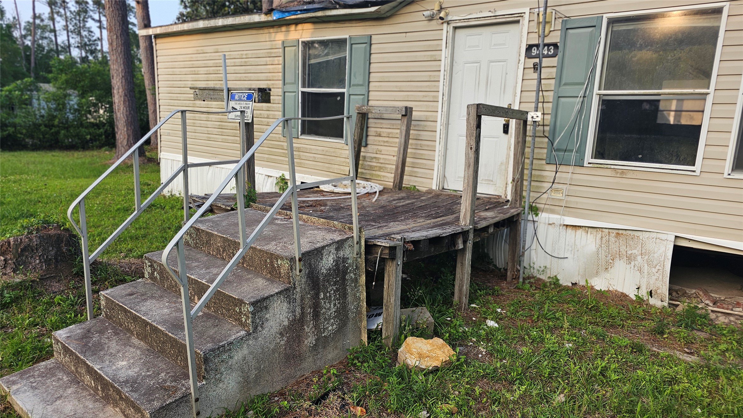 9443 1st Street Lumberton, TX 77657 - Photo 2 of 7 a backyard of a house with table and chairs