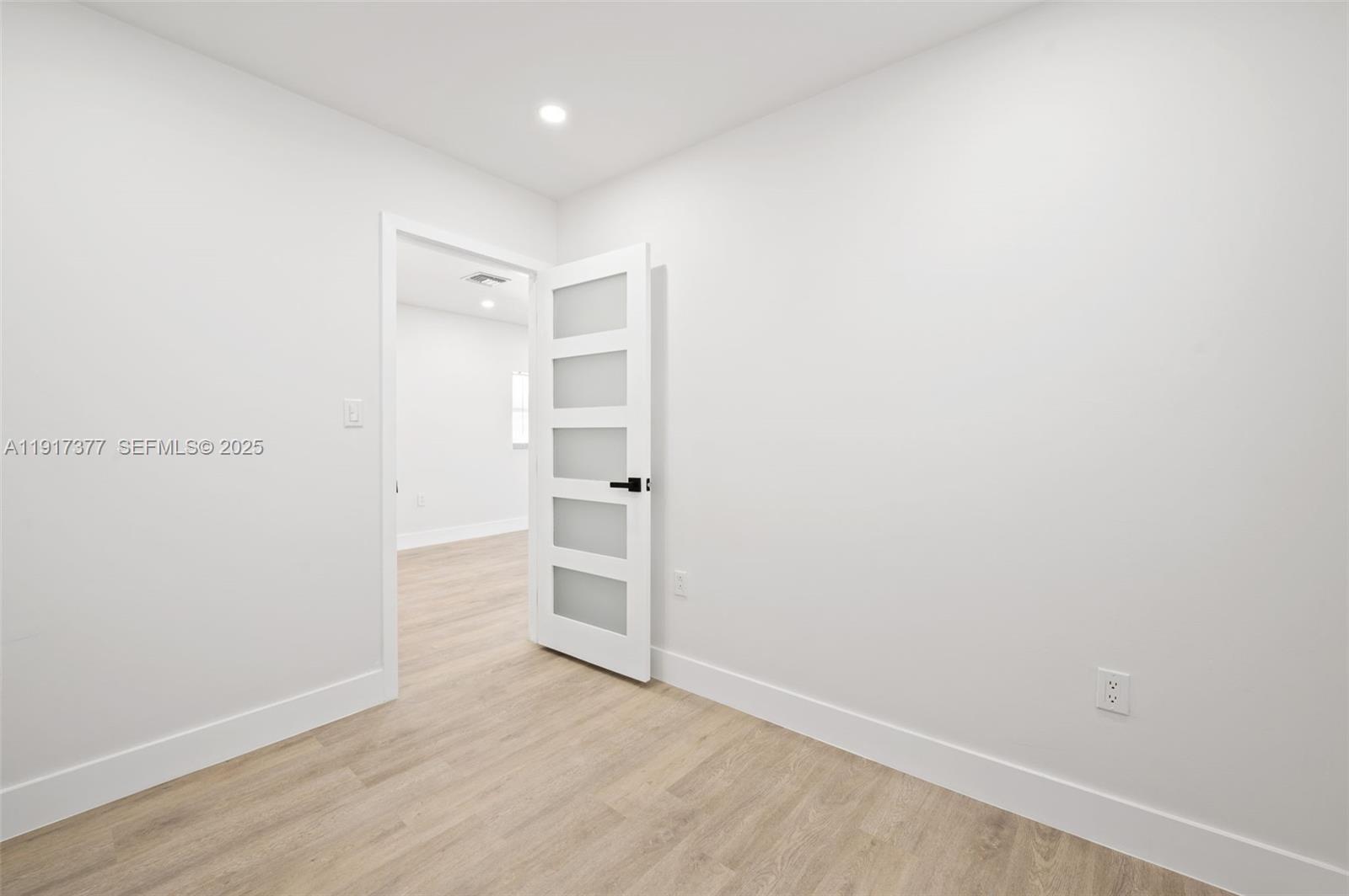 1844 Northwest 67th Street Miami, FL 33147 - Photo 17 of 27 a view of empty room