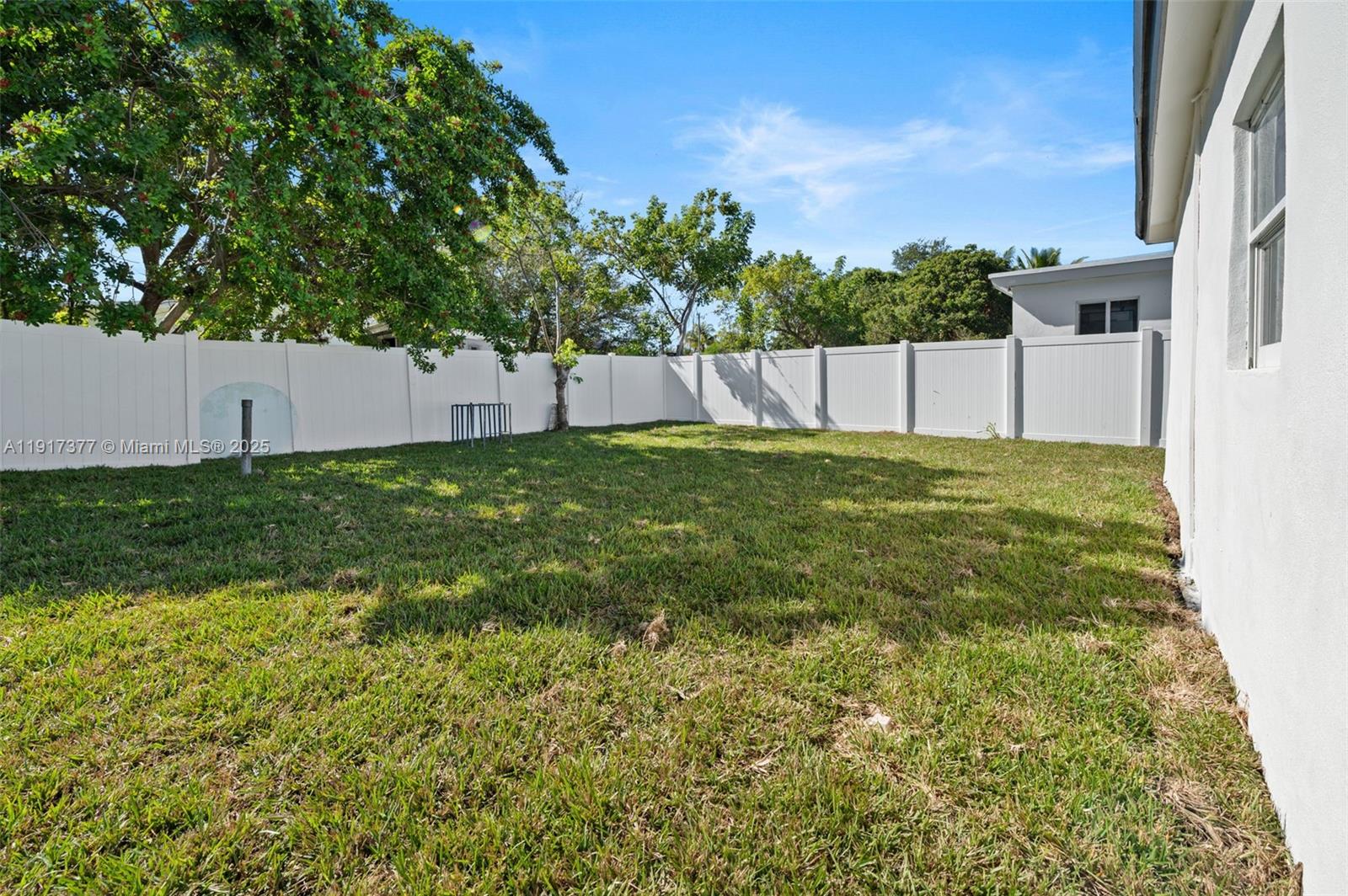 1844 Northwest 67th Street Miami, FL 33147 - Photo 20 of 27 a view of a backyard