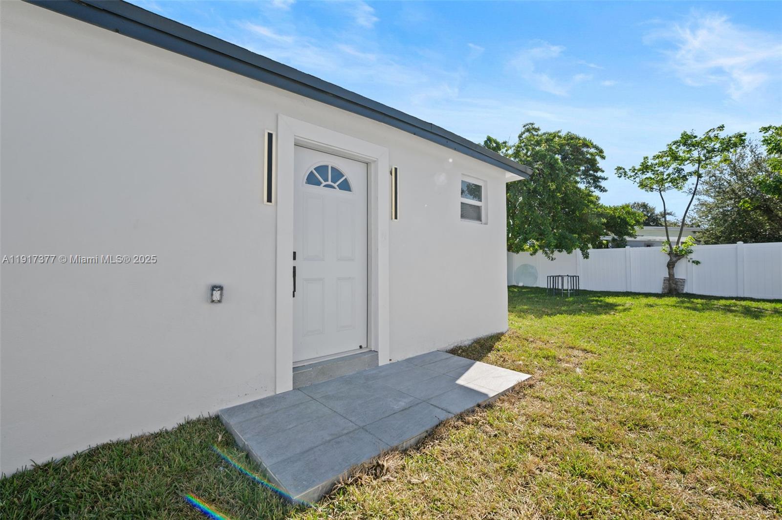 1844 Northwest 67th Street Miami, FL 33147 - Photo 7 of 27 a backyard of a house