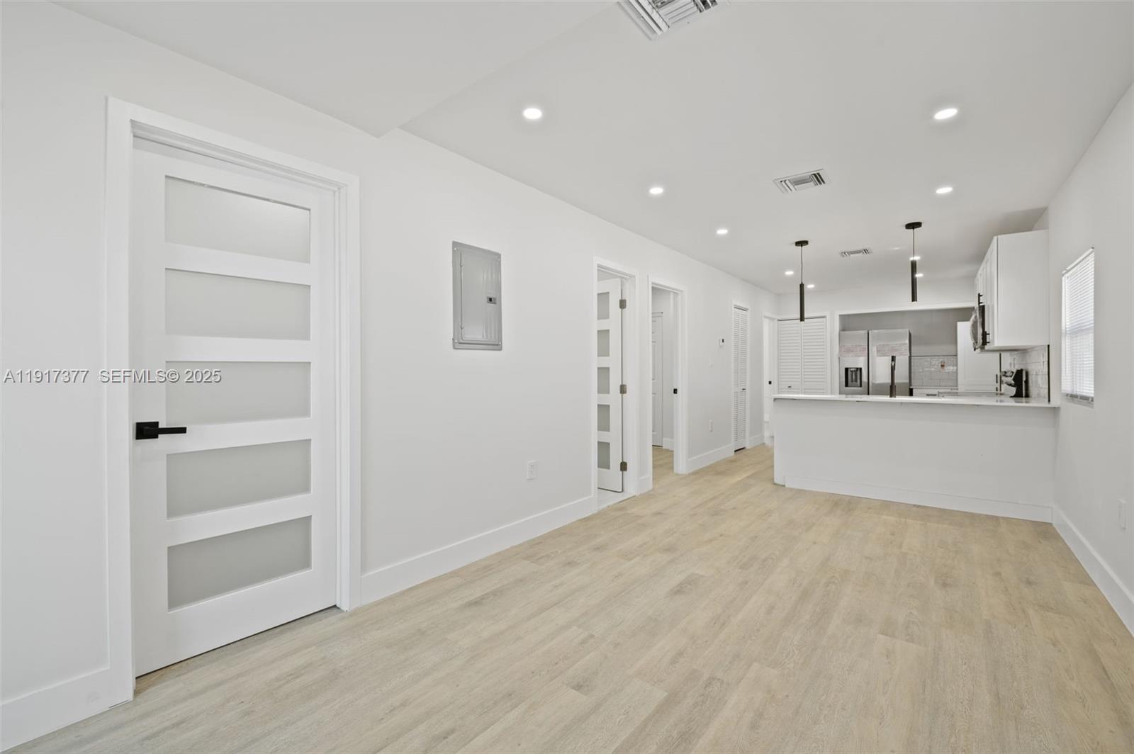 1844 Northwest 67th Street Miami, FL 33147 - Photo 10 of 27 a view of a kitchen with refrigerator and window