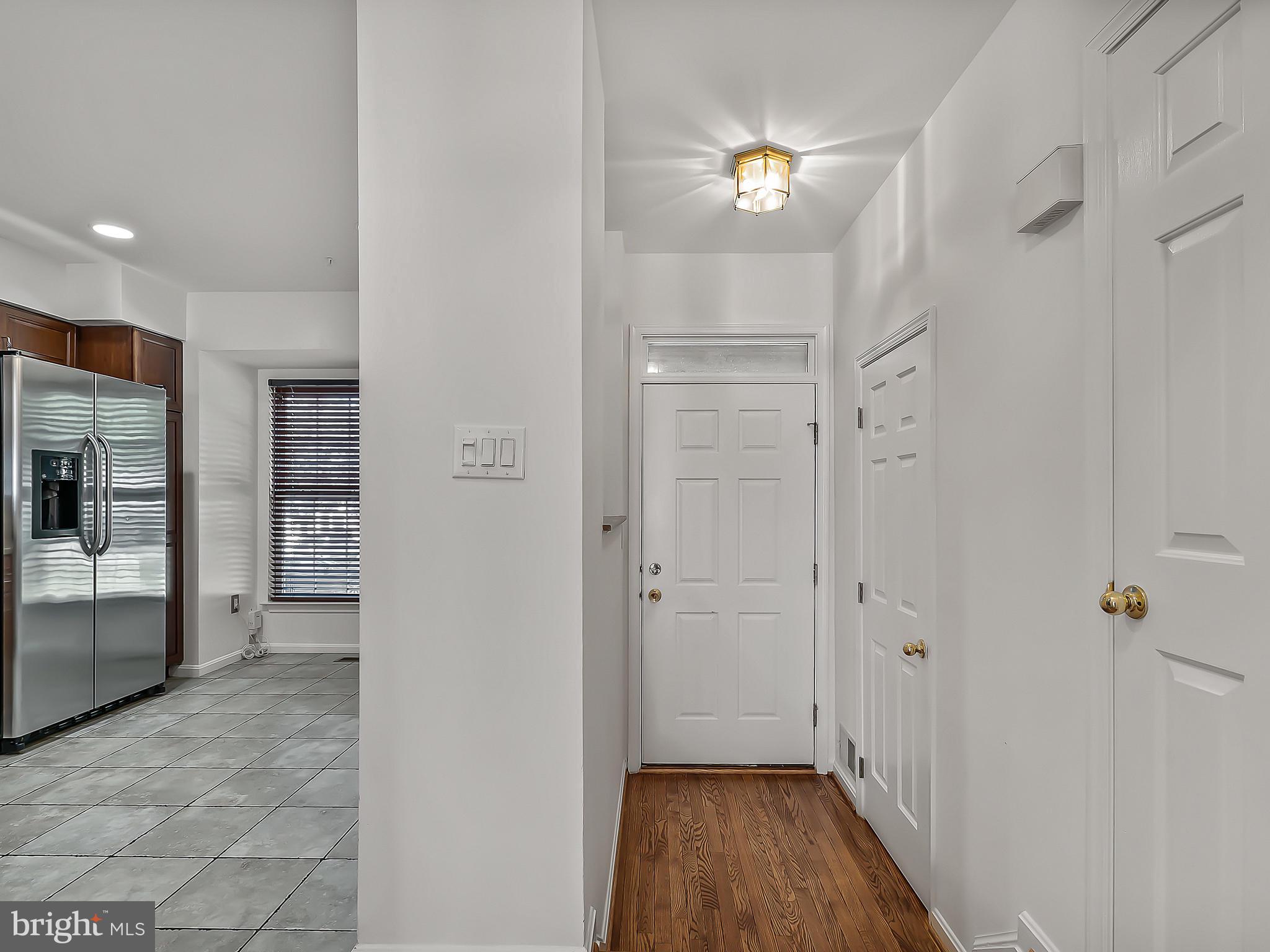 16820 Centerfield Way Olney, MD 20832 - Photo 4 of 48 Foyer with Coat Closet and Half Bath