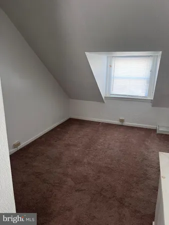 a view of an empty room with window