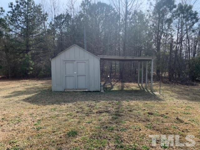 1410 Langdon Road Angier, NC 27501 - Photo 3 of 7 a house view with backyard space