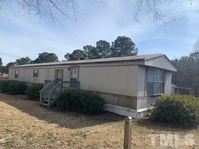 1410 Langdon Road Angier, NC 27501 - Photo 5 of 7 a view of a small house