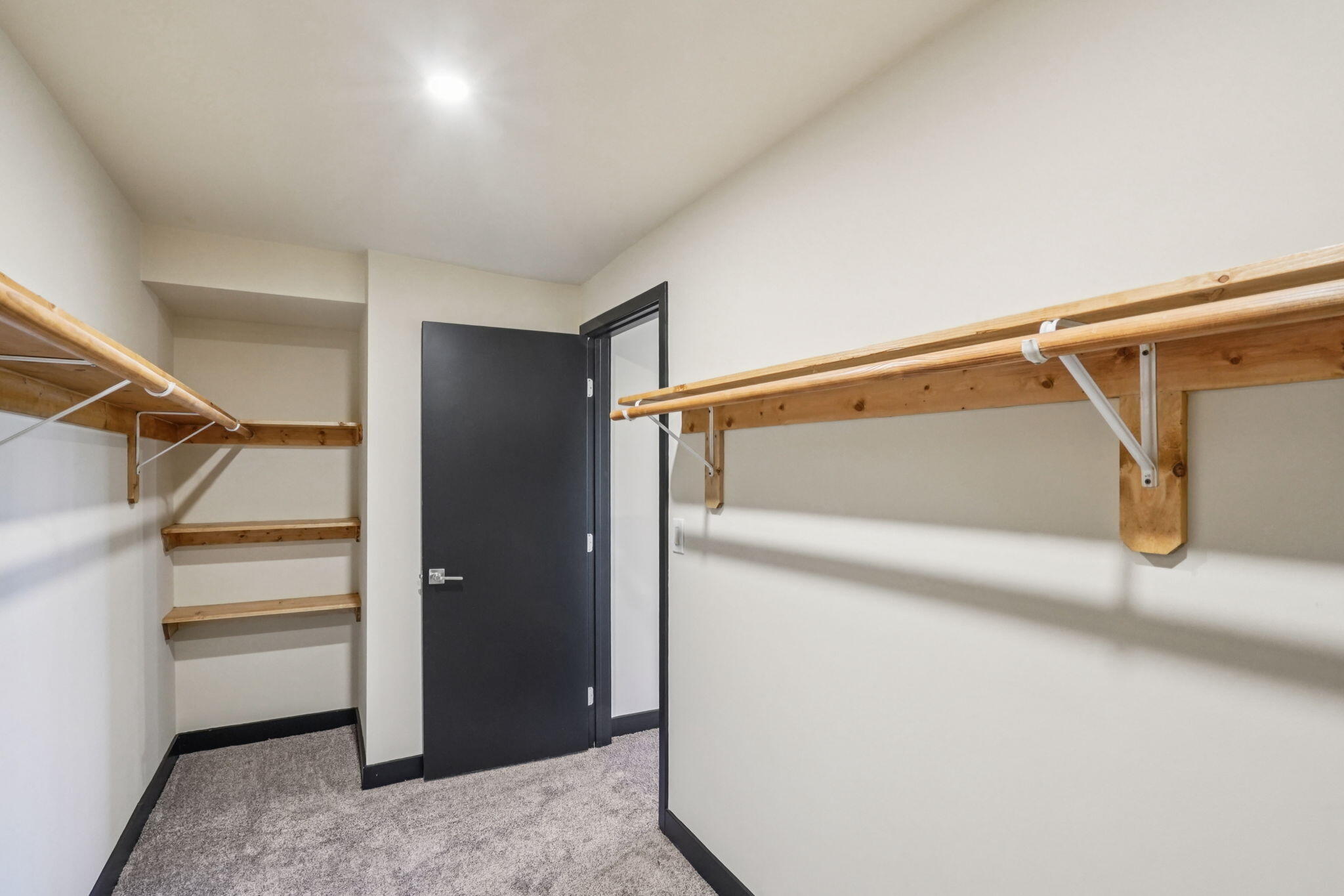 54091 North Ridge Drive Idyllwild, CA 92549 - Photo 35 of 58 a view of walk in closet with empty racks