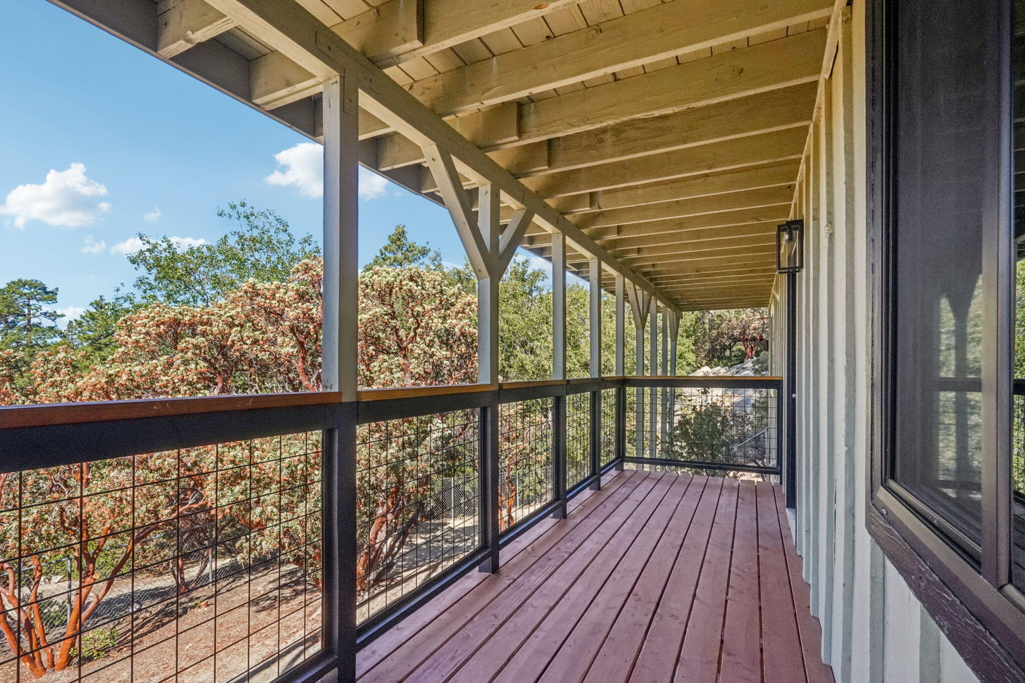54091 North Ridge Drive Idyllwild, CA 92549 - Photo 37 of 58 a view of balcony with wooden floor