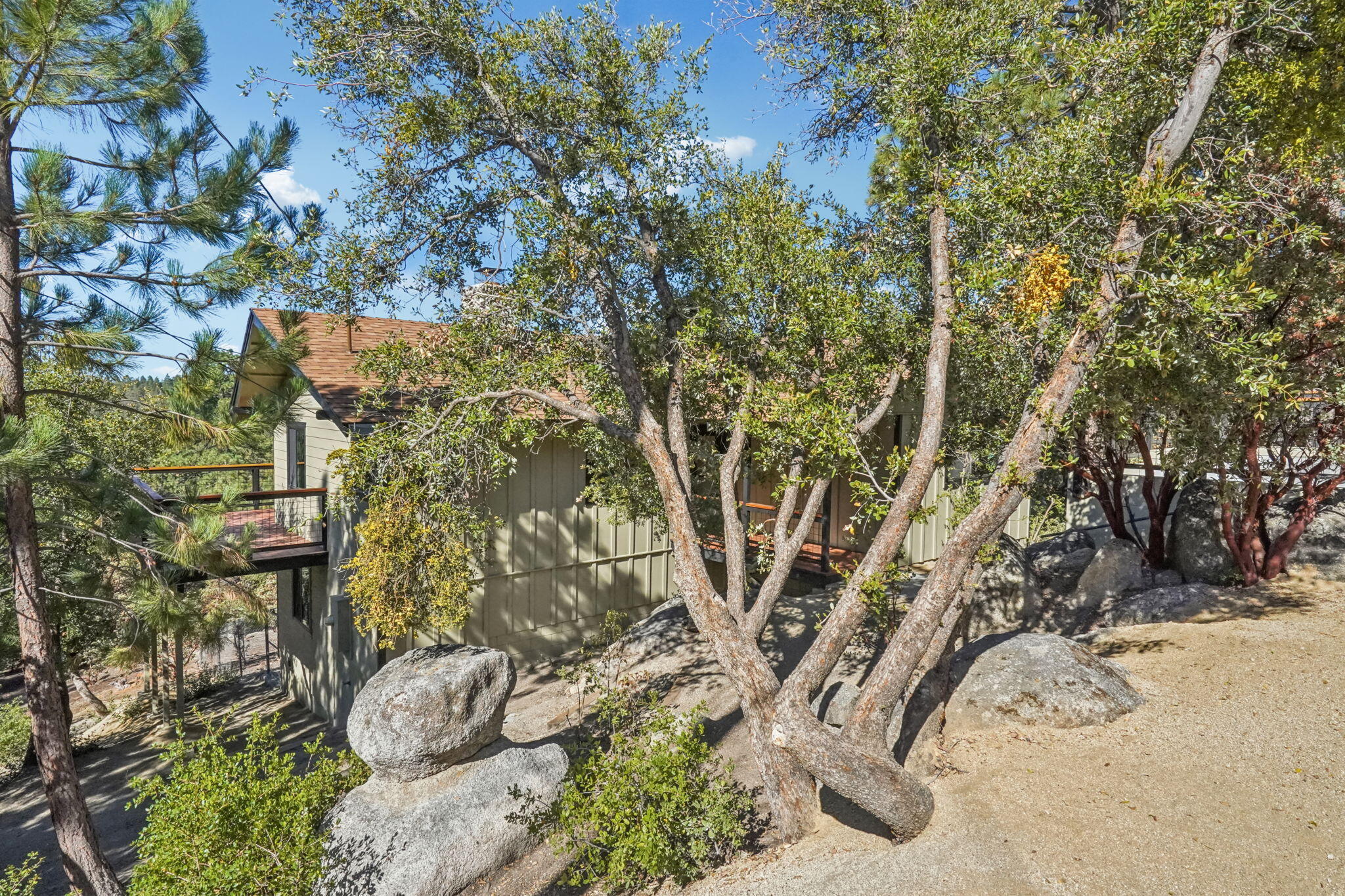 54091 North Ridge Drive Idyllwild, CA 92549 - Photo 41 of 58 a view of a yard with table and chair