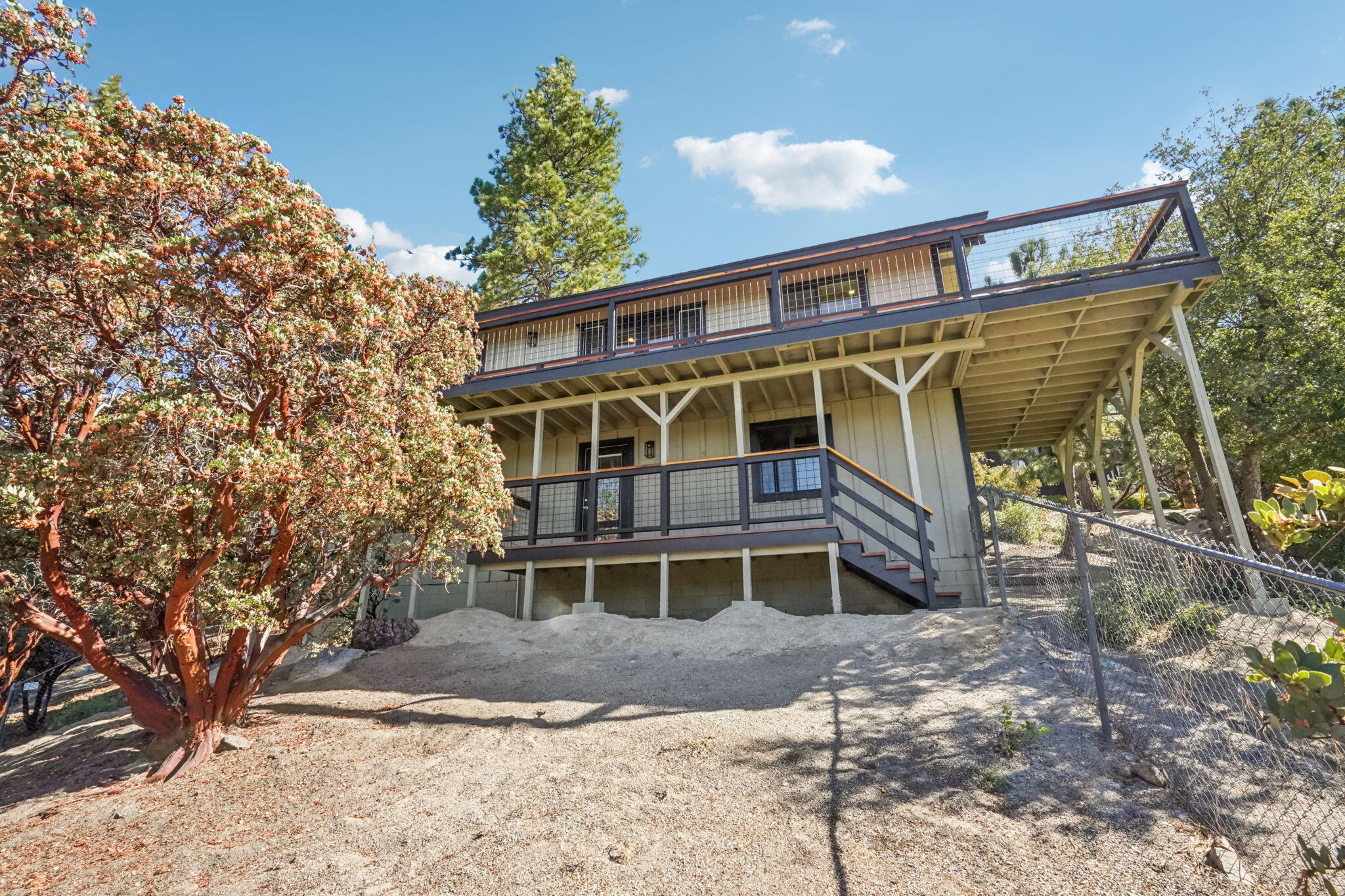 54091 North Ridge Drive Idyllwild, CA 92549 - Photo 43 of 58 a front view of a house with a yard
