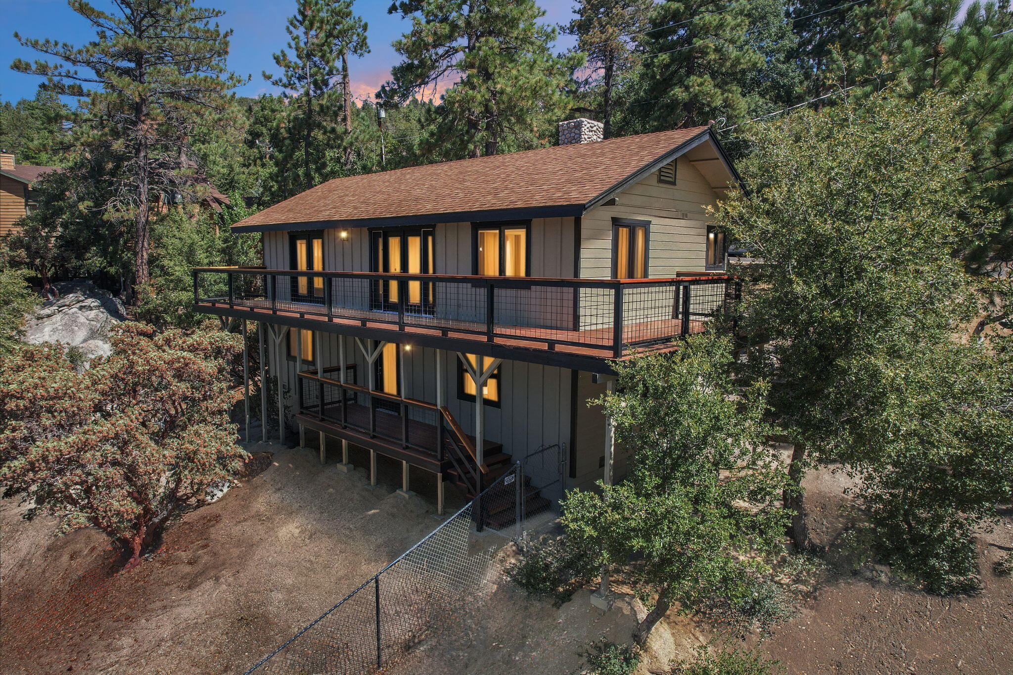54091 North Ridge Drive Idyllwild, CA 92549 - Photo 58 of 58 a backyard of a house with table and chairs