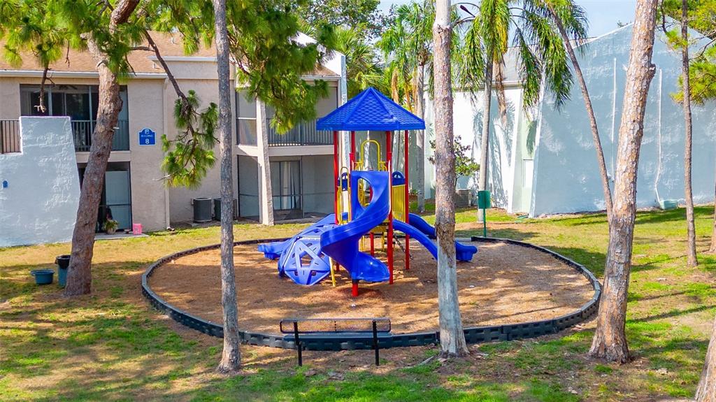 13300 Walsingham Road, Unit 56 Largo, FL 33774 - Photo 3 of 35 a view of pool with a slide
