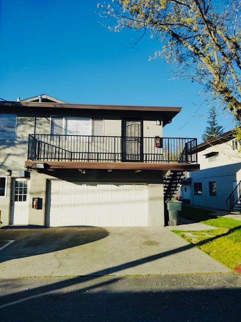 a view of a house with a patio