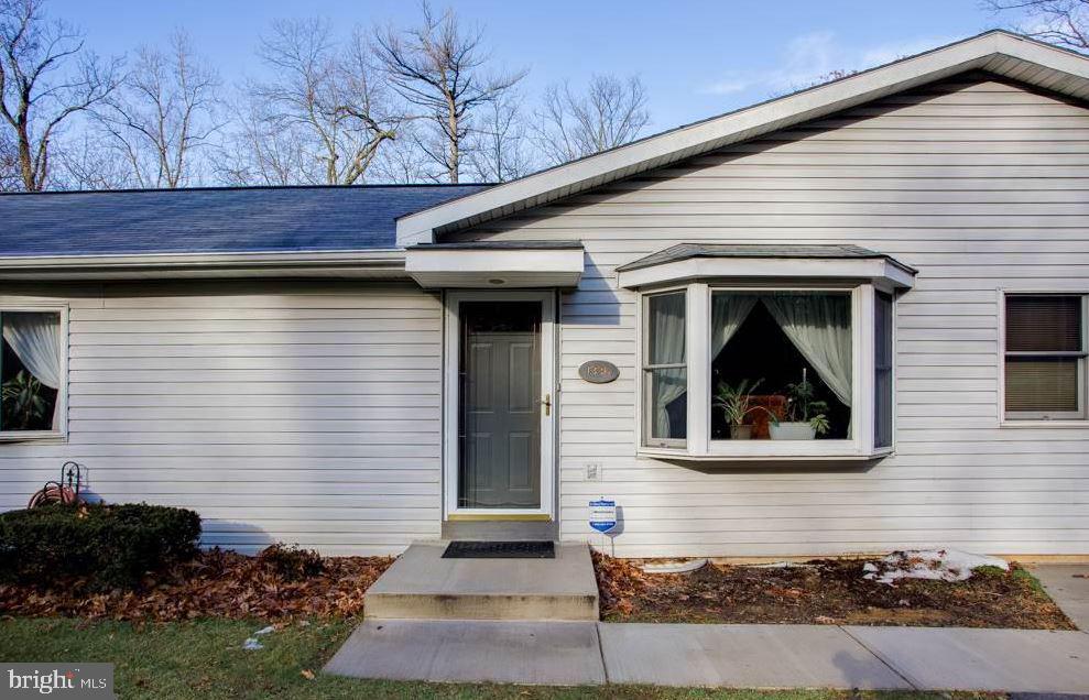 1336 Piketown Road Harrisburg, PA 17112 - Photo 2 of 29 a front view of a house with a garden