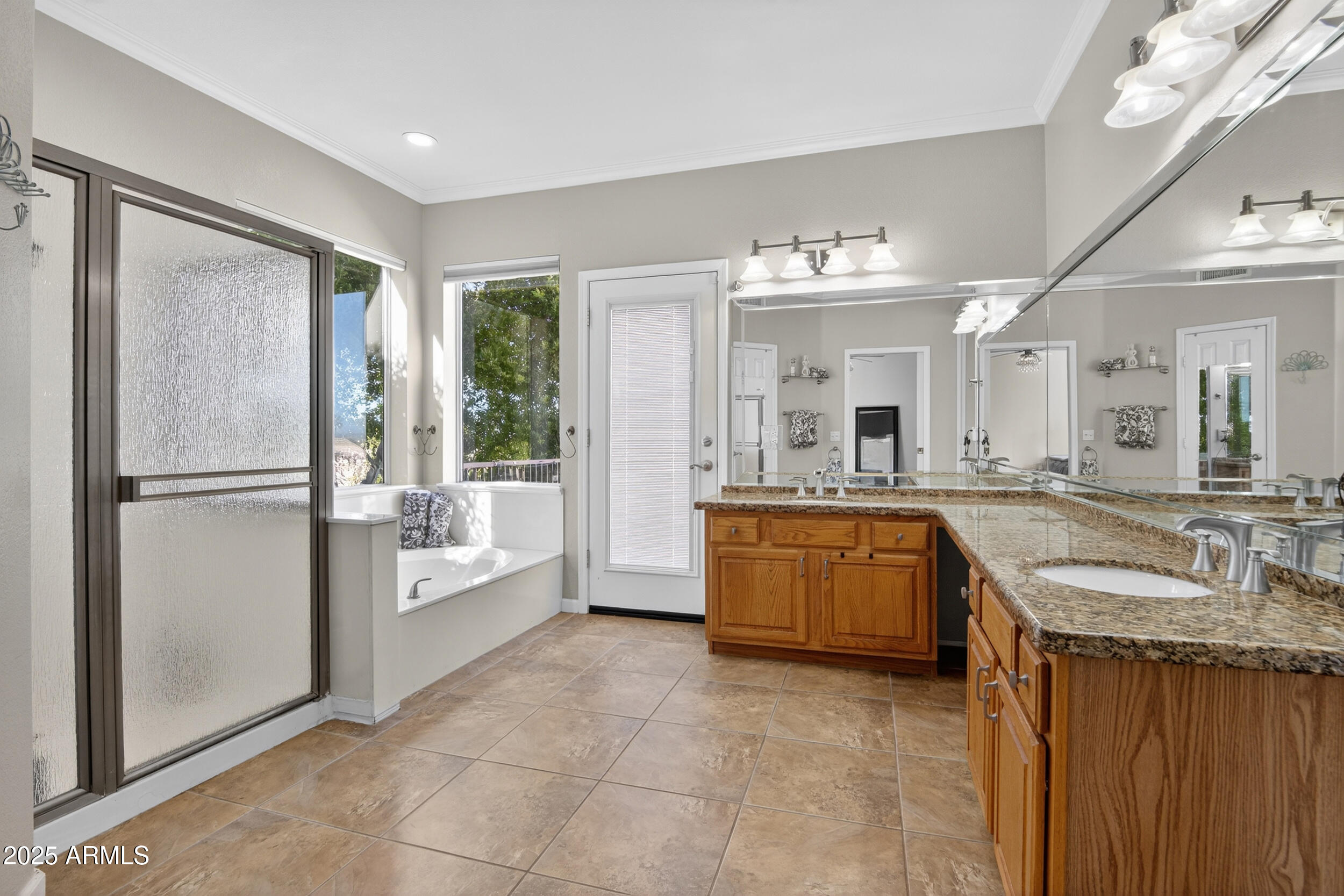 1614 East Kathleen Road Phoenix, AZ 85022 - Photo 16 of 30 a large bathroom with a granite countertop tub sink shower and mirror