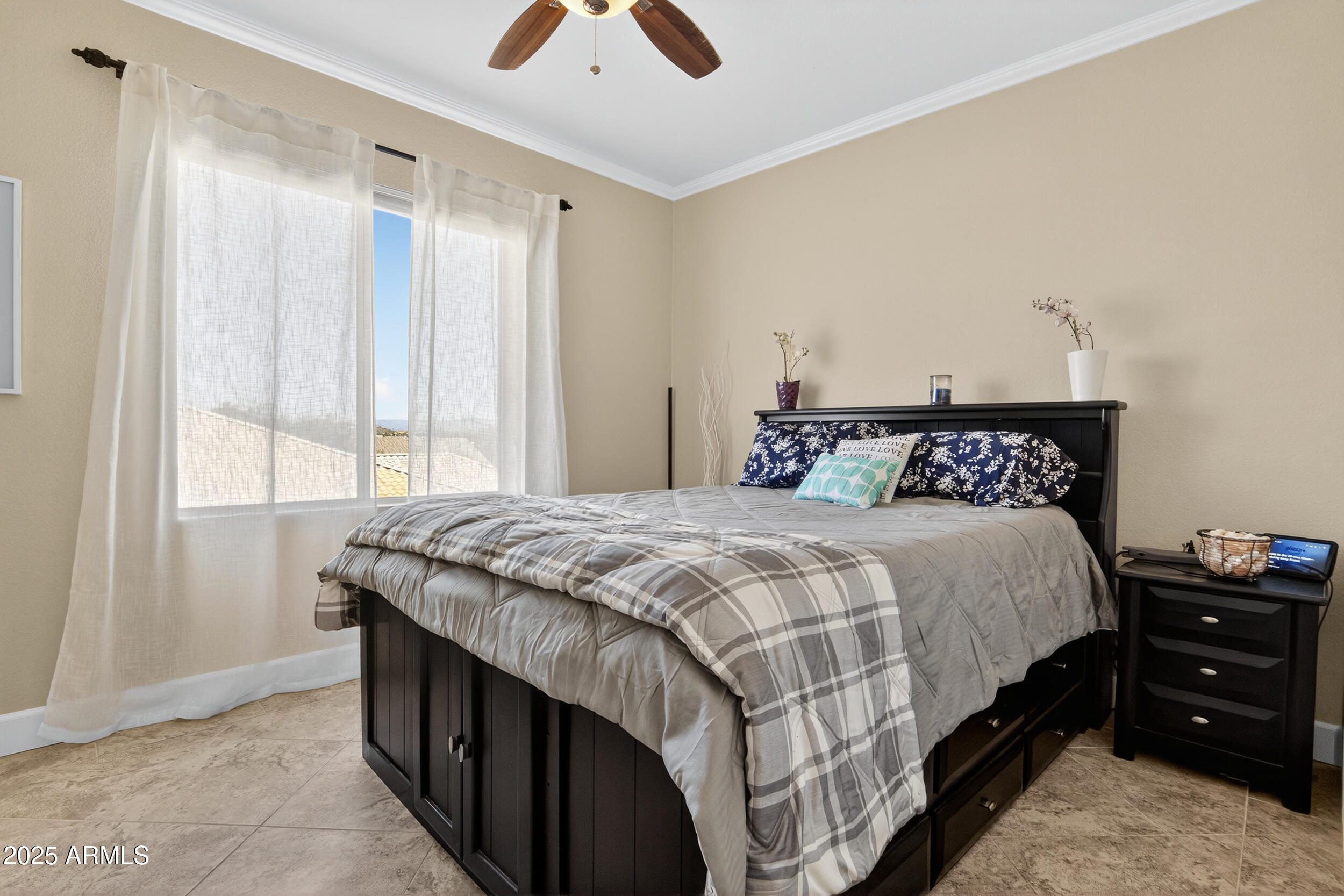 1614 East Kathleen Road Phoenix, AZ 85022 - Photo 20 of 30 a bedroom with a bed and a window