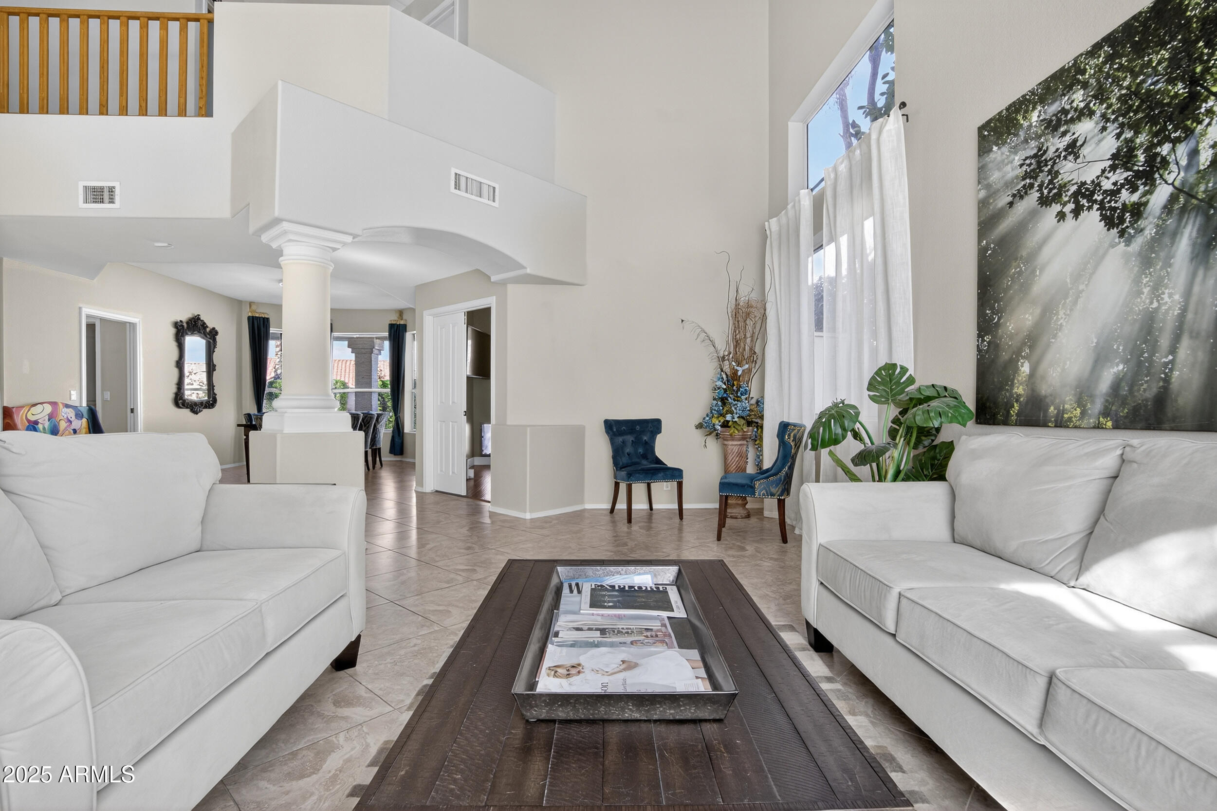1614 East Kathleen Road Phoenix, AZ 85022 - Photo 2 of 30 a living room with furniture and a rug