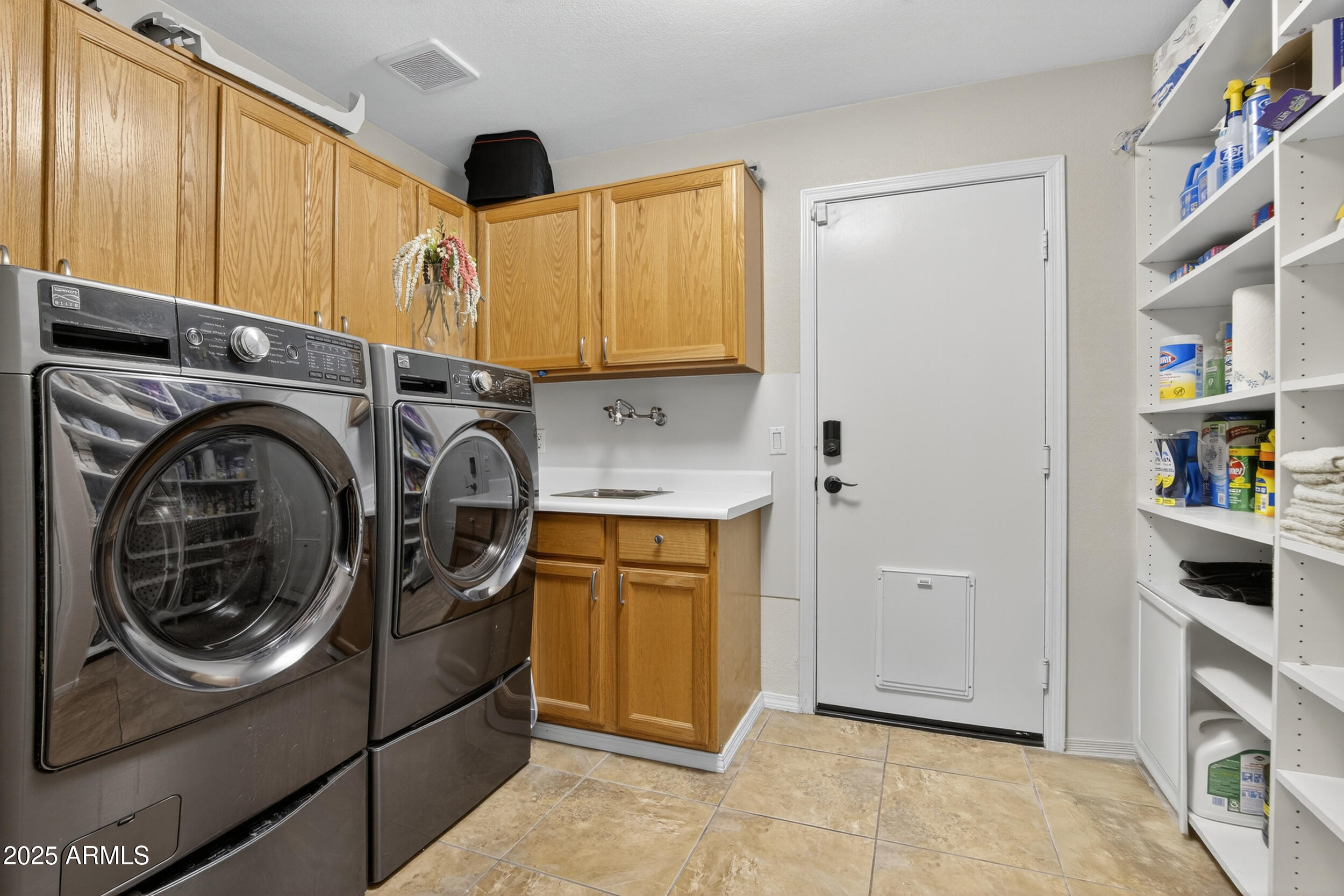 1614 East Kathleen Road Phoenix, AZ 85022 - Photo 23 of 30 a utility room with sink dryer and washer