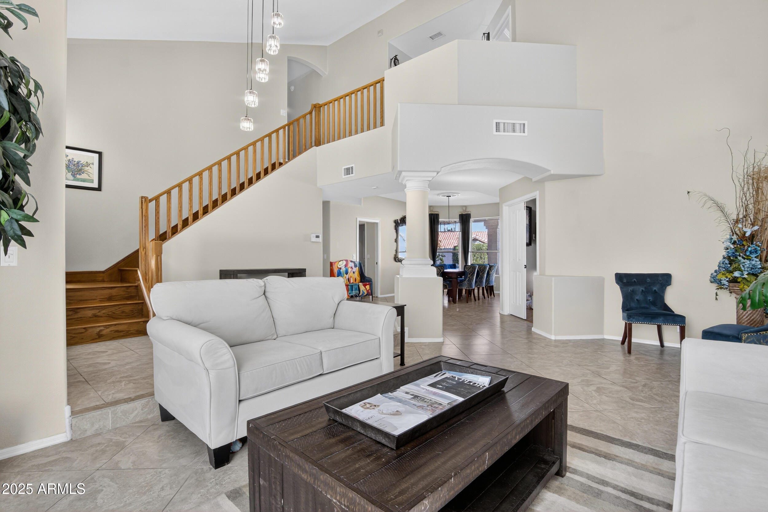 1614 East Kathleen Road Phoenix, AZ 85022 - Photo 3 of 30 a living room with furniture and wooden floor