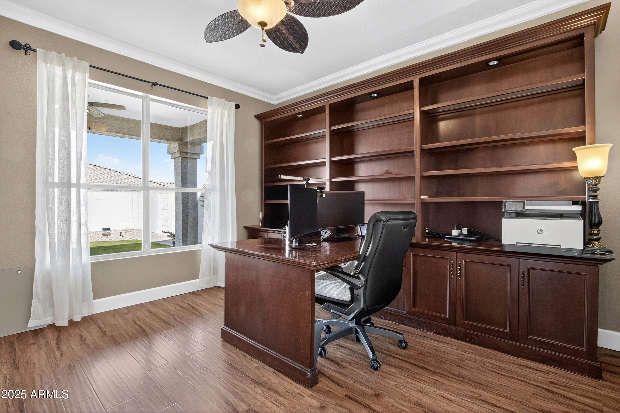 1614 East Kathleen Road Phoenix, AZ 85022 - Photo 7 of 30 a view of a workspace with furniture and a window
