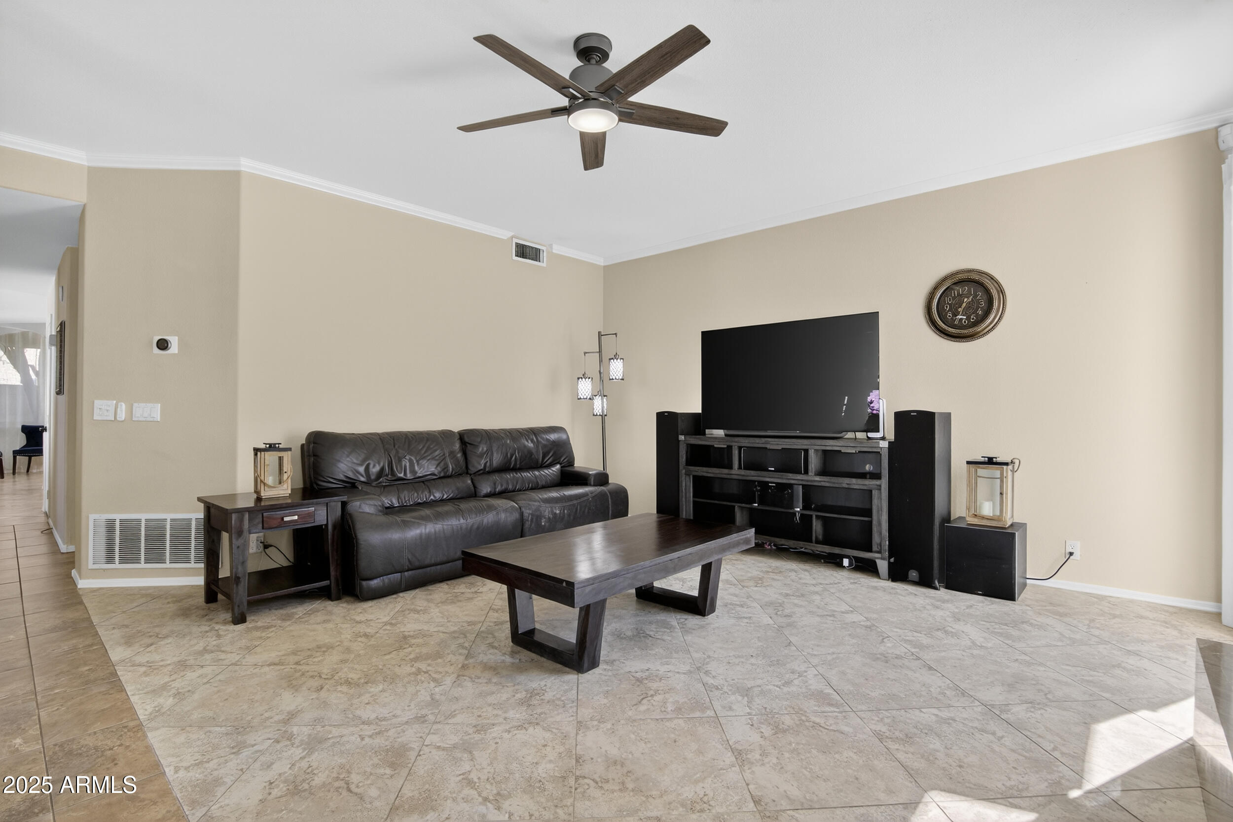 1614 East Kathleen Road Phoenix, AZ 85022 - Photo 9 of 30 a living room with furniture and a flat screen tv