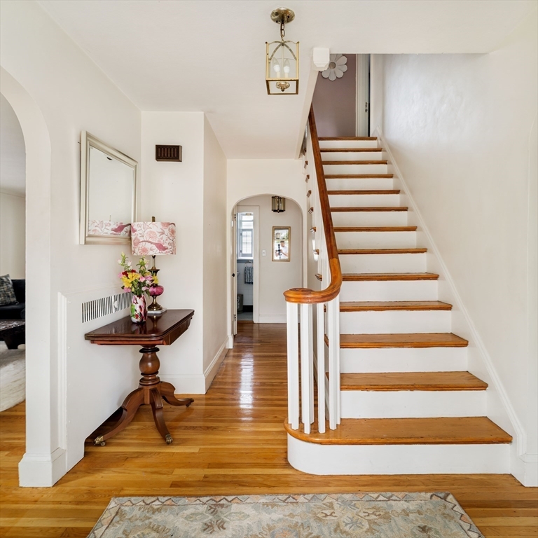 7 St Marys Road Milton, MA 02186 - Photo 14 of 31 a view of entryway and hall with wooden floor